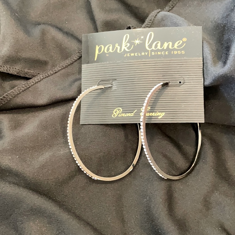 Hematite with channel set crystal earrings.